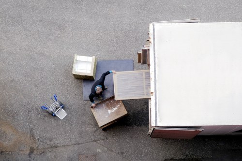Organized storage unit in Richmond with labeled boxes and furniture